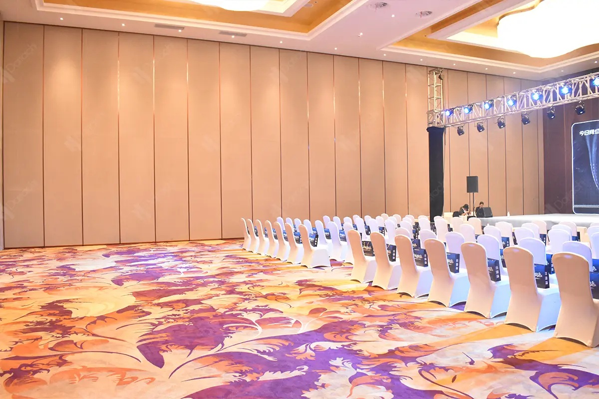 Manual operable partition in a hotel ballroom