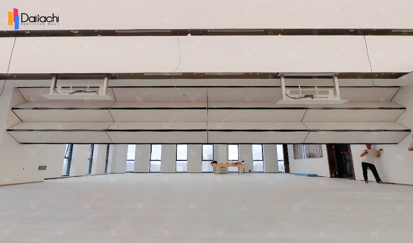 extra large off-white vertical folding lifting wall in the open area extra large off-white vertical folding lifting wall in the open area
