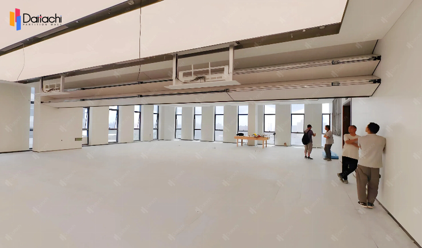 extra large off-white vertical folding lifting wall in the open area extra large off-white vertical folding lifting wall in the open area