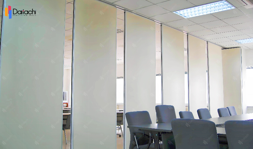 Light beige movable partition wall in empty office Light beige movable partition wall in empty office