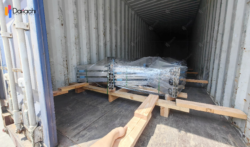Images of forklifts transporting goods in wooden crates.