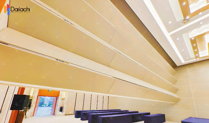 Understated, large-area gold-colored vertical lifting wall system