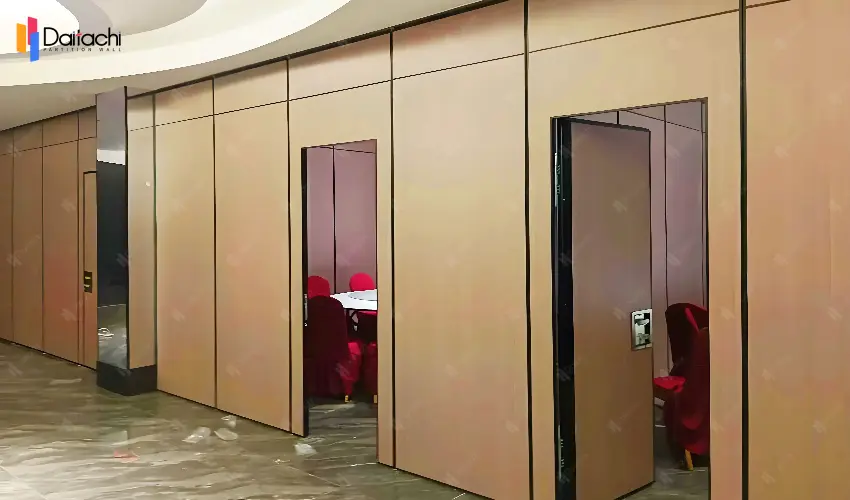 Brown movable partition wall with doors in hotel interior Brown movable partition wall with doors in hotel interior