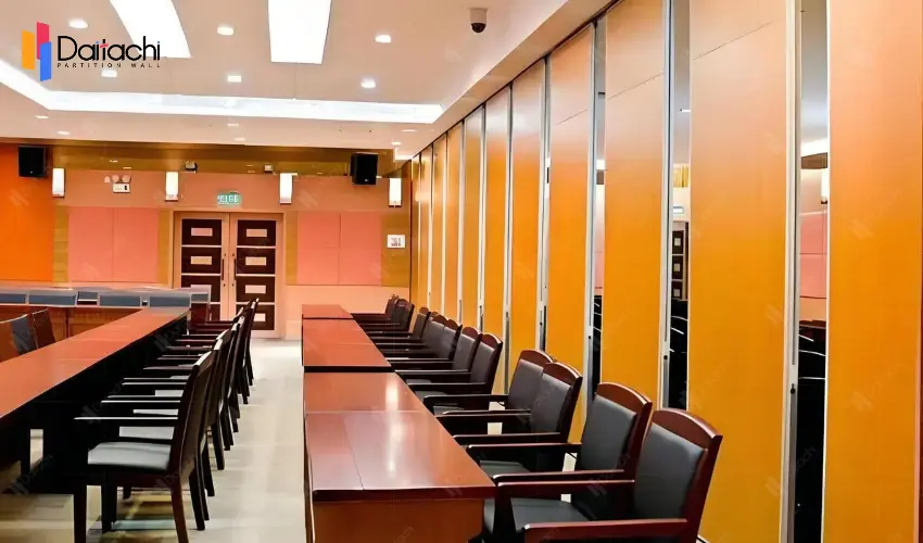 Orange movable partition wall in the large conference room Orange movable partition wall in the large conference room