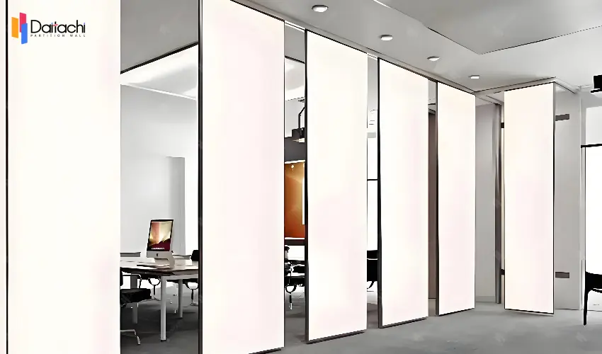 White manual movable partition wall paired with gray carpet White manual movable partition wall paired with gray carpet
