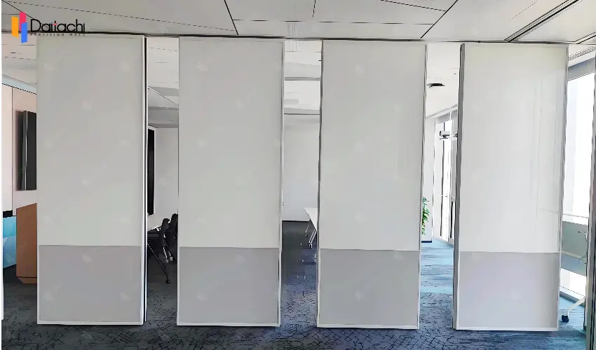 The hotel features a simple wooden-textured partition wall with a manually movable door. The hotel features a simple wooden-textured partition wall with a manually movable door.