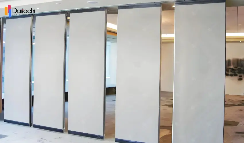 White manual movable partition wall in the vacant space