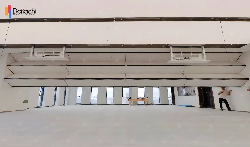 extra large off-white vertical folding lifting wall in the open area extra large off-white vertical folding lifting wall in the open area