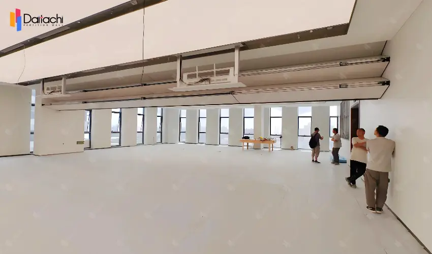 extra large off-white vertical folding lifting wall in the open area extra large off-white vertical folding lifting wall in the open area