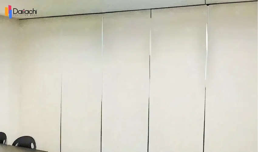 Solid color minimalist manual movable partition wall in the conference room