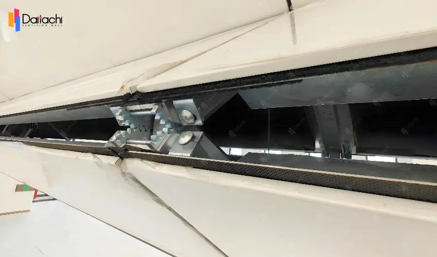 Bottom strip for vertical folding partition walls