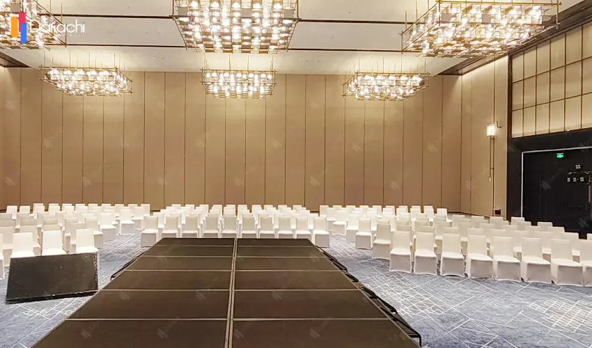 Ultra-high, minimalist, and luxurious movable partition wall for hotels.