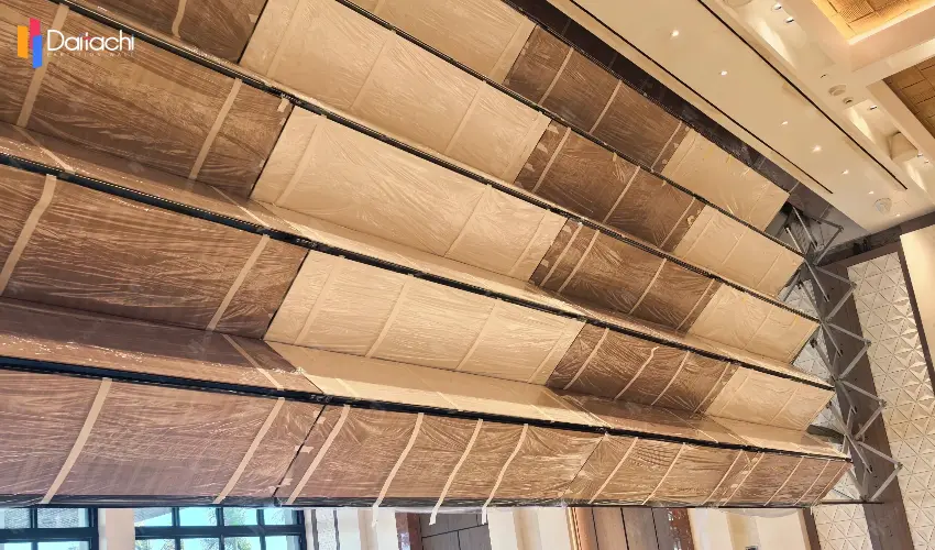 Minimalist vertical-lifting folding wall featuring a two-tone brown and white design.